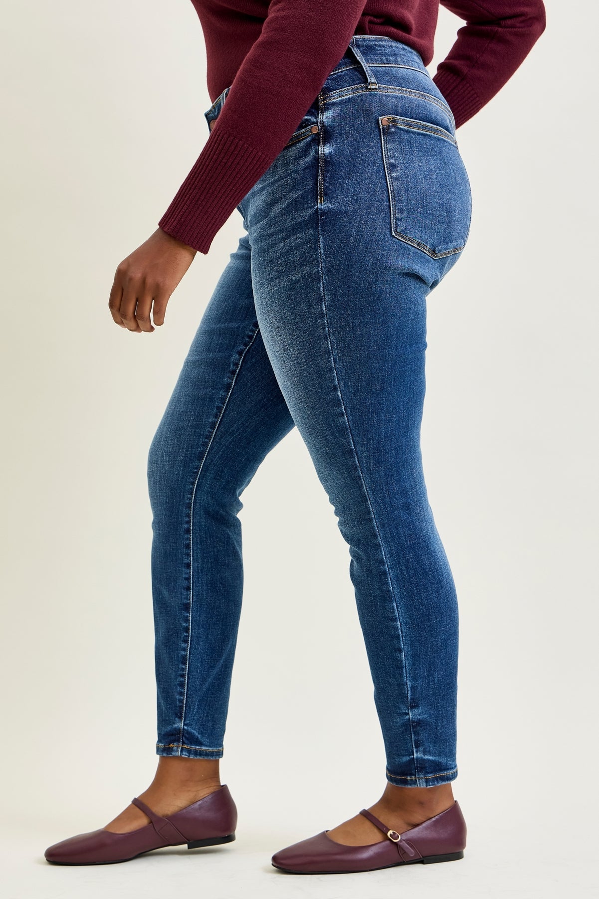 Joey Mid Rise Skinny Jeans With Handsand - PLUS
