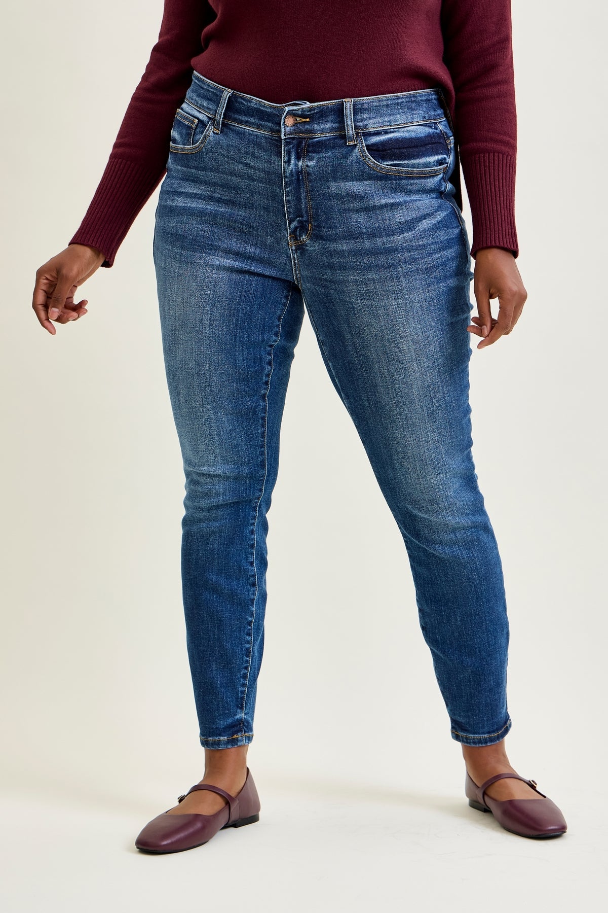 Joey Mid Rise Skinny Jeans With Handsand - PLUS